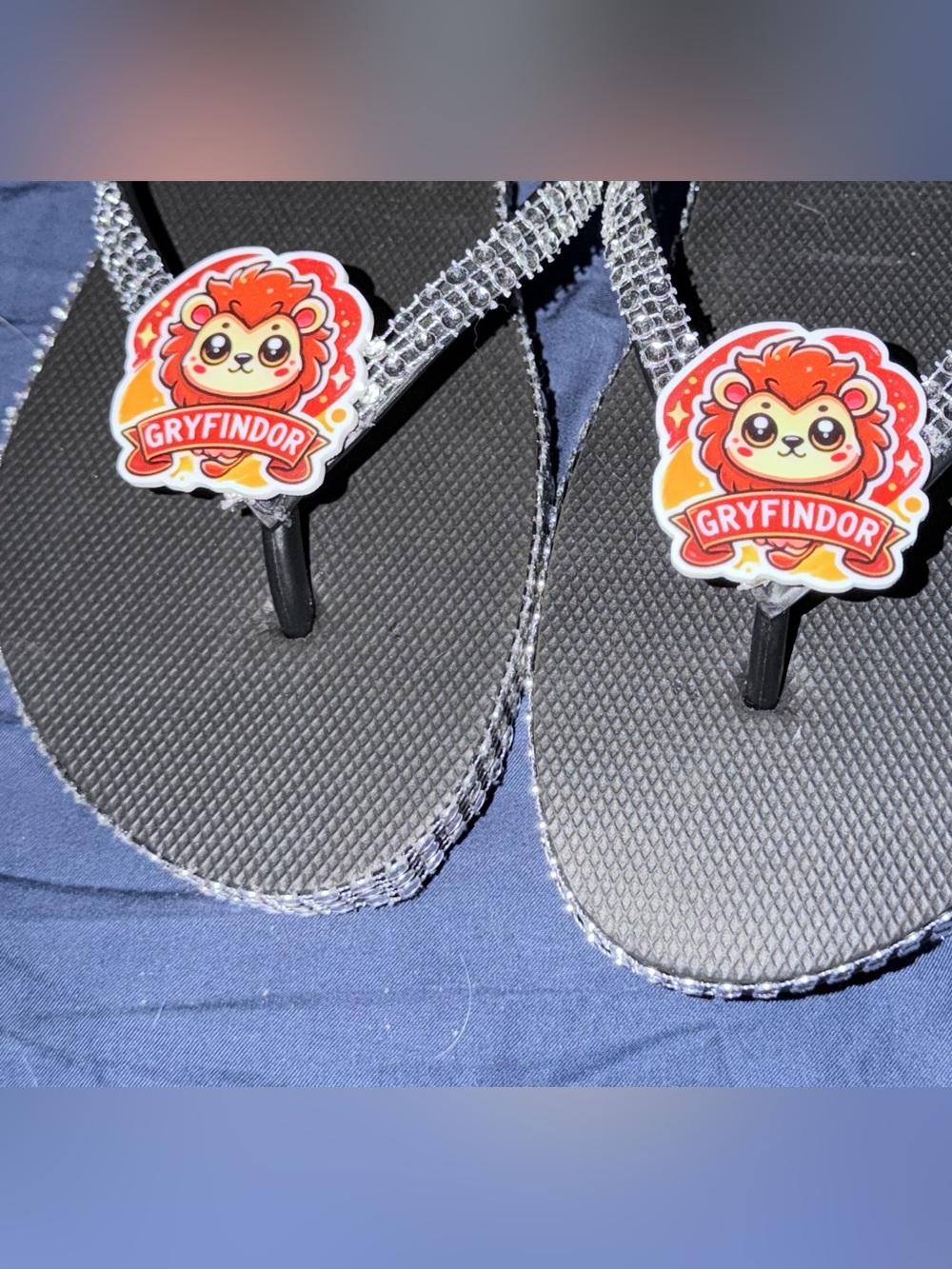 Black Flip Flop Sandals with Red Crest